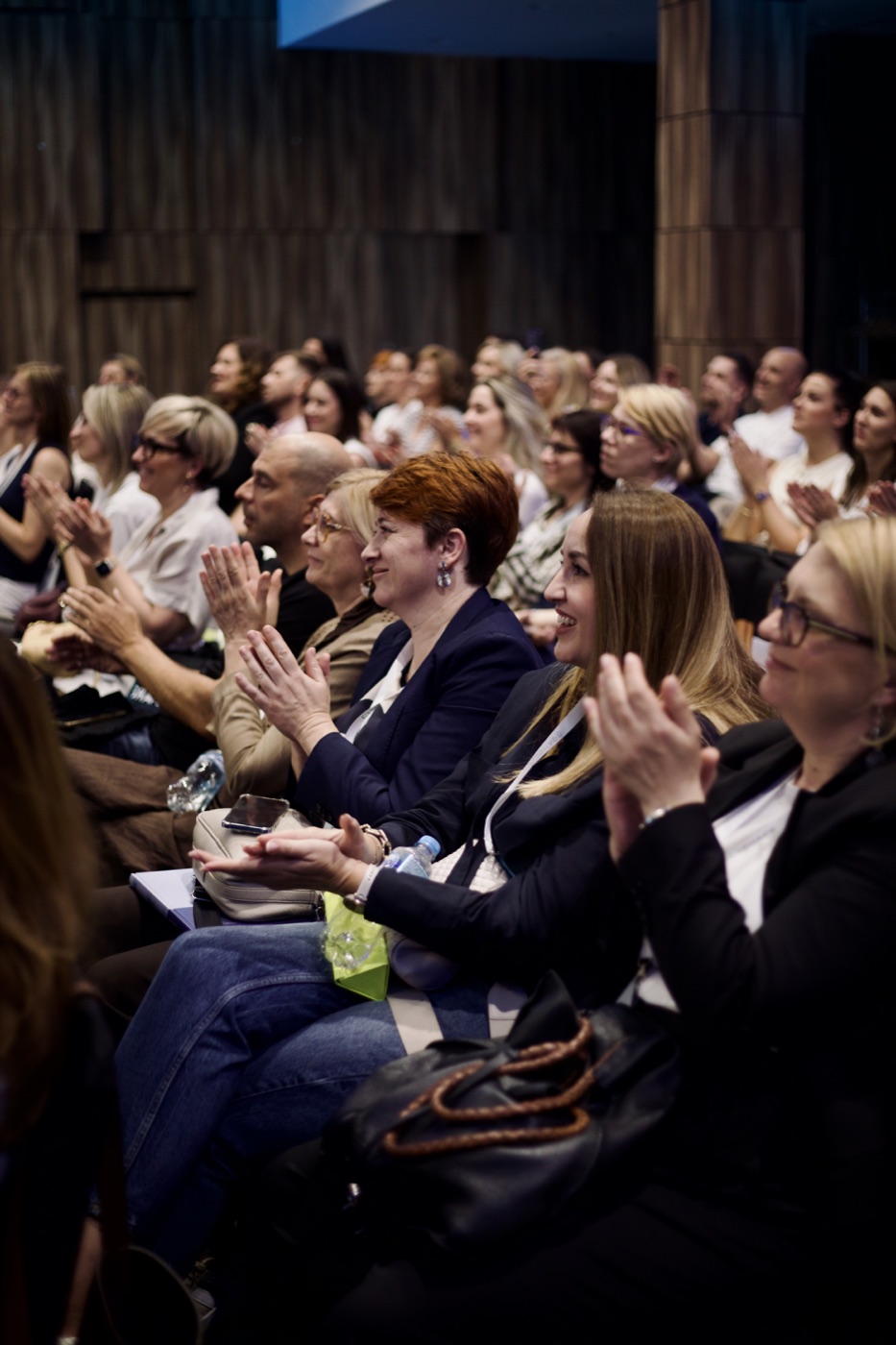Audience applauding during SHAPE Symposium 2026