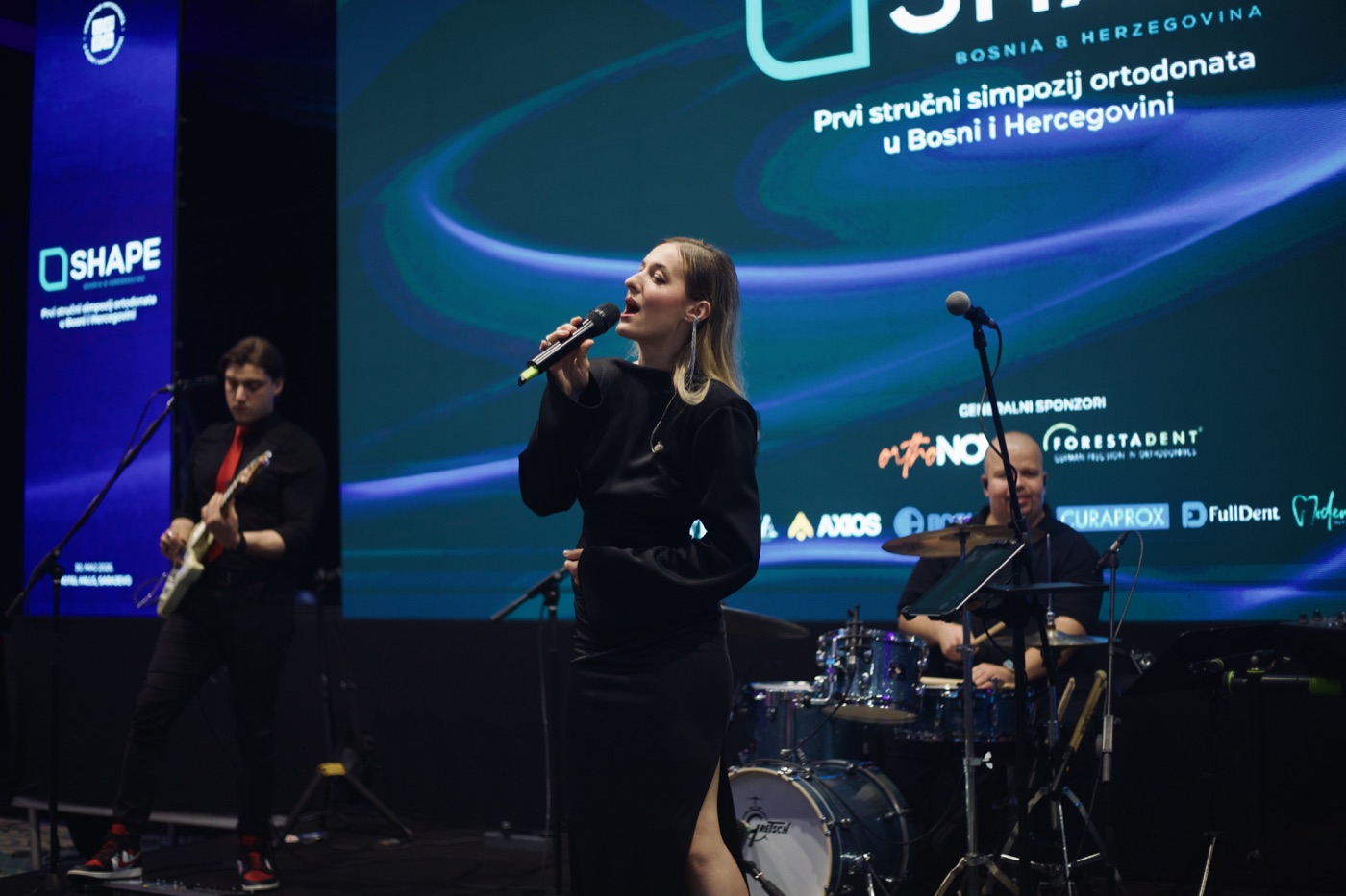 Singer performing at the SHAPE Symposium gala dinner
