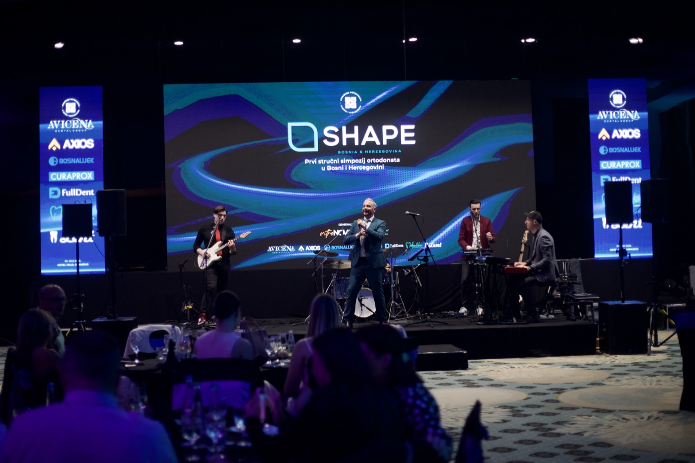 Guests enjoying the SHAPE Symposium celebration